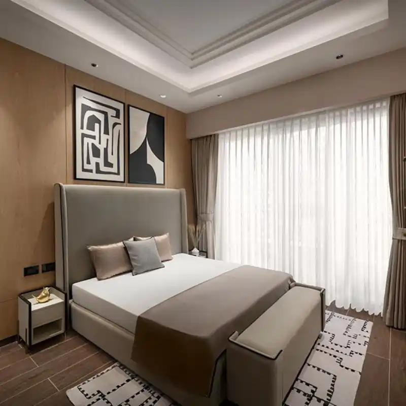 Wave Eden spacious master bedroom with warm tones and natural lighting